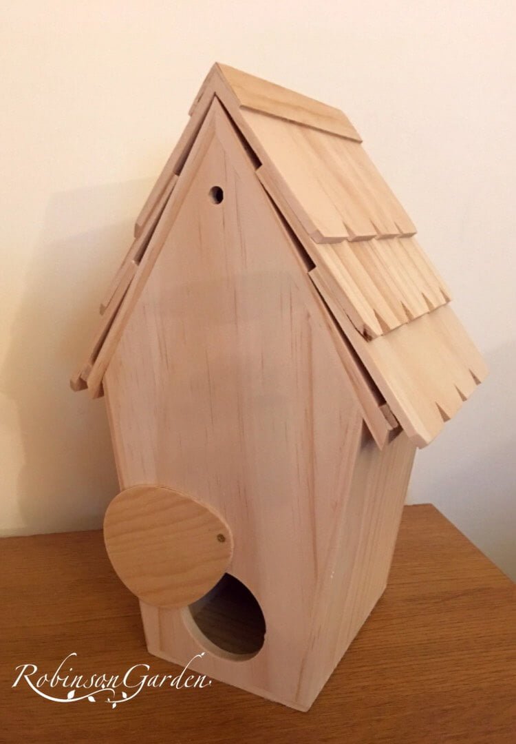 Bespoke wooden birdbox / birdhouse design hand painted in Lincolnshire, England, UK using Farrow & Ball exterior eggshell paint or external Varnish. Uniquely crafted using sustainable FSC certified timber / wood. Available in a range of colours including varnish and unpainted to allow you to paint your own birdhouse. This will prevent the how to make your own birdhouse or how to make your own birdbox question. Birdbox camera not included, birdhouse camera not included. The birdbox design is different to Argos, B&M, ALDI, homebase, dobbies, gardman, home bargains, pets at home, B&Q, b & q, amazon, M&S, Robert dyas, rspb, ikea, john lewis, rhs, gumtree, asda, argos, wilkinsons, kingfisher, the garden obelisk company, QVC or any other garden centre. We are an online only store and we are not on the high street. We also have outlet shops across etsy and ebay UK. Not made from metal or copper. Our design plan, dimensions and height are suitable for small birds including blue tits, grey tits, Goldfinch, house sparrow, Chaffinch, Long-tailed tit, siskin and Robin. Amendments on request can be made for titcotes. Bespoke wooden birdhouses and birdboxes are assembly free and no set up required. Visit our gallery to see all the bespoke wooden birdhouse images. Dovecotes are hand delivered ready assembled. Perfect birdhouses for your garden. Designs include Lyndhurst wooden birdhouse, Stamford wooden birdbox and Burley birdbox. With wooden roof.